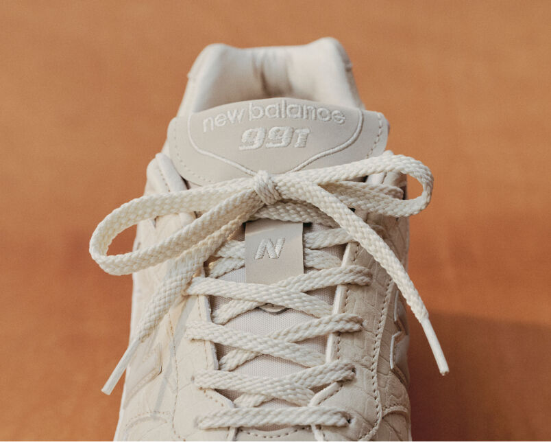 Close up view of a New Balance Made in UK sneaker tongue and laces.  